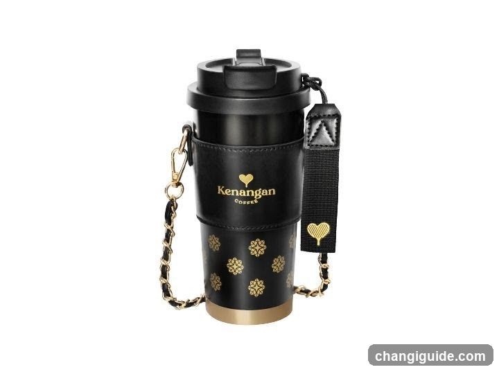 Black coffee cup with gold accents