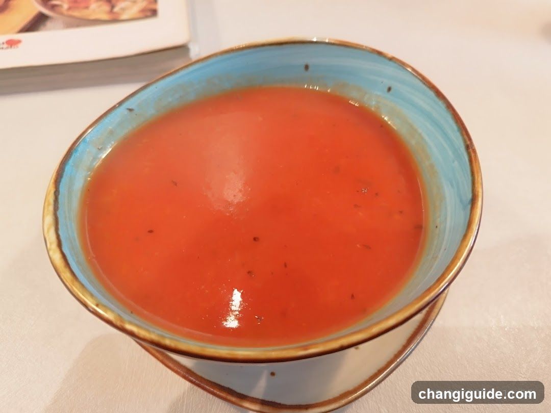 Red Soup in Ceramic Bowl