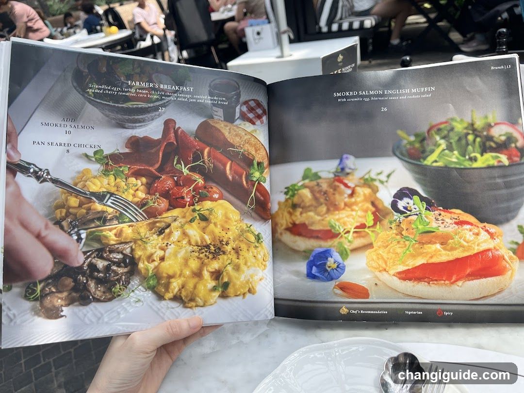 Open Menu Book Displaying Breakfast Items