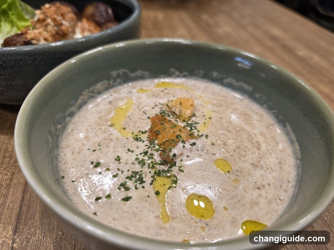 Creamy Soup with Croutons and Olive Oil