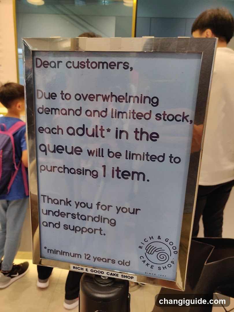 Queue Limit Sign at Rich & Good Cake Shop