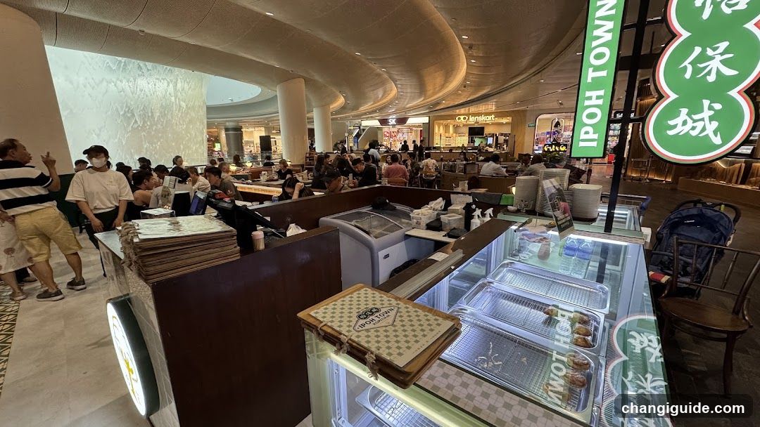 Food Court Interior with Display Case and Crowd