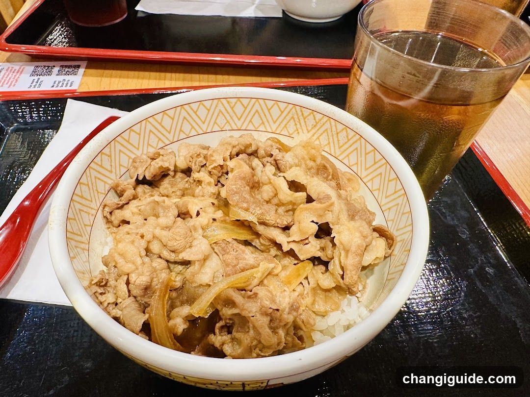 Bowl of Tonkatsu Rice Bowl with Drink