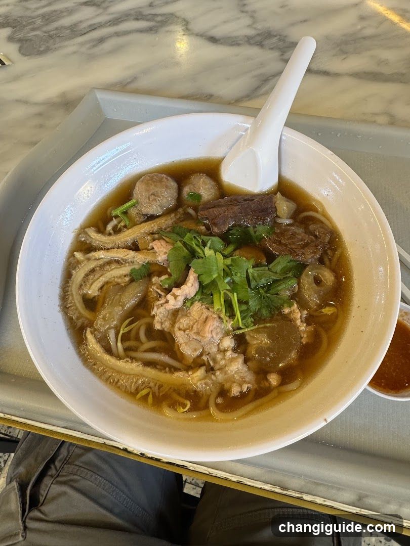 Bowl of Noodle Soup with Meatballs and Beef