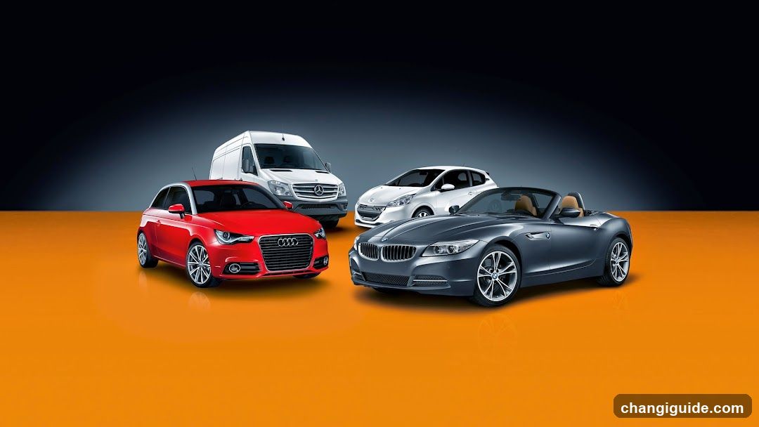 A studio shot featuring four vehicles on an orange floor against a dark gradient background. From left to right: a red Audi A3 hatchback, a white Mercedes-Benz van, a white compact car (possibly a Fiat 500), and a grey BMW Z4 convertible. No signage or shop front is visible.