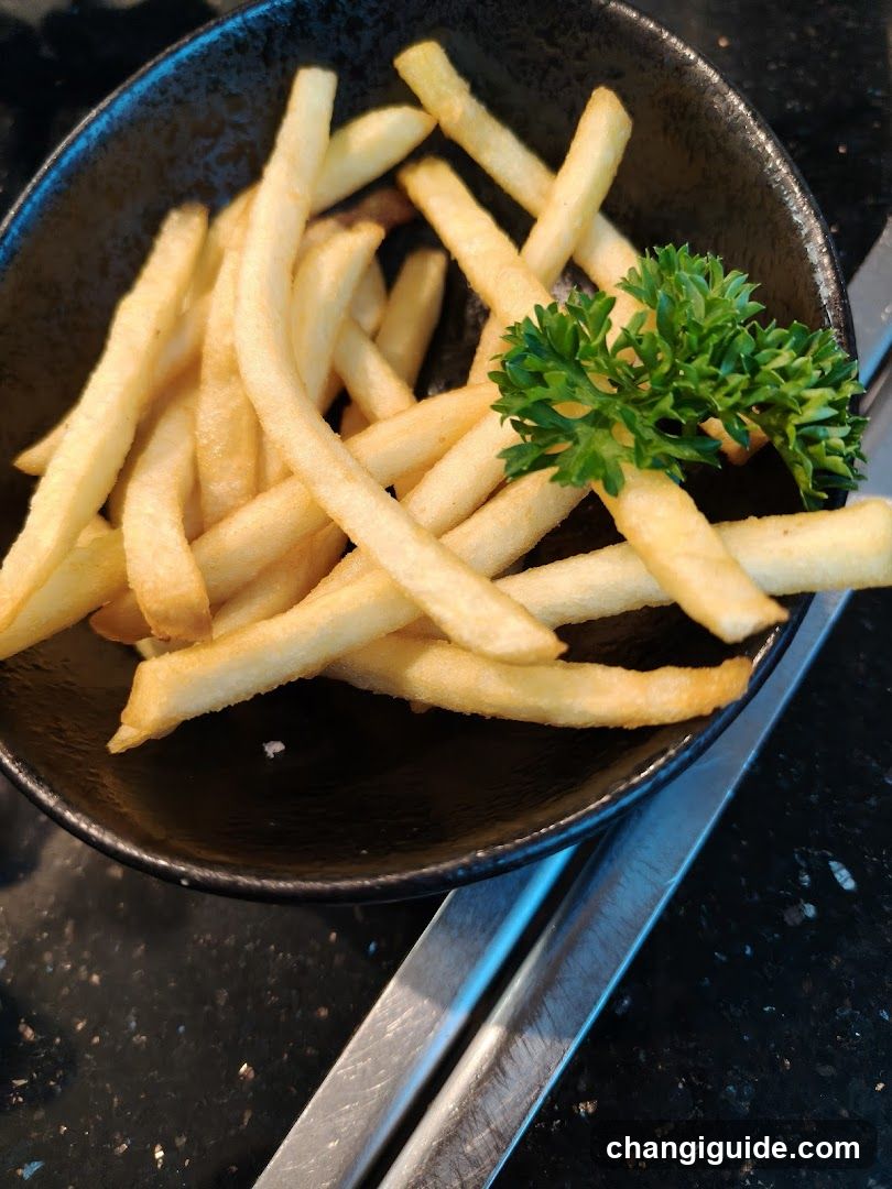 French Fries with Parsley Garnish