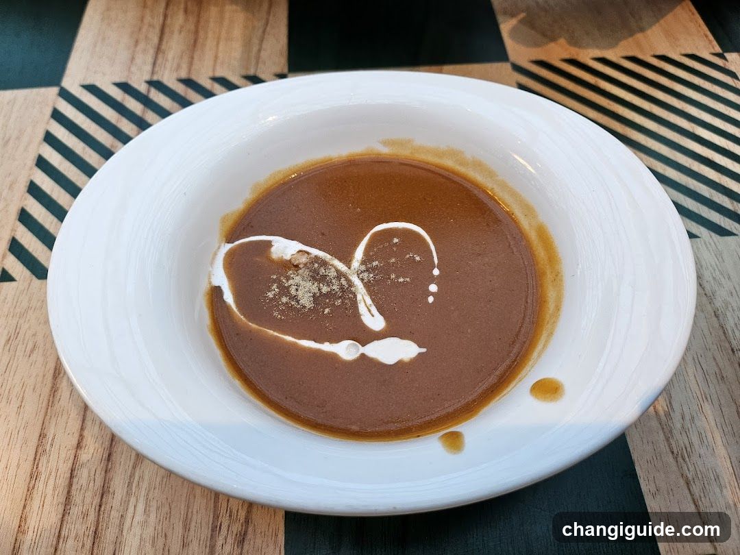 Bowl of Soup with Cream Swirl