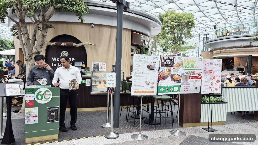 Food Court Exterior with Staff and Promotional Displays