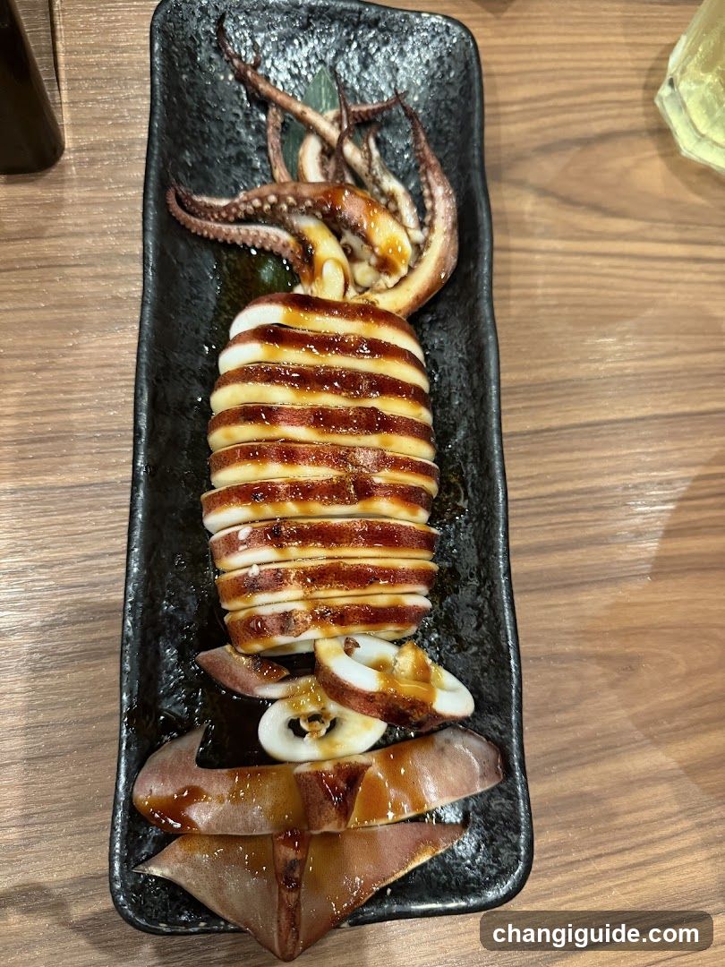 Squid Dish on Black Plate