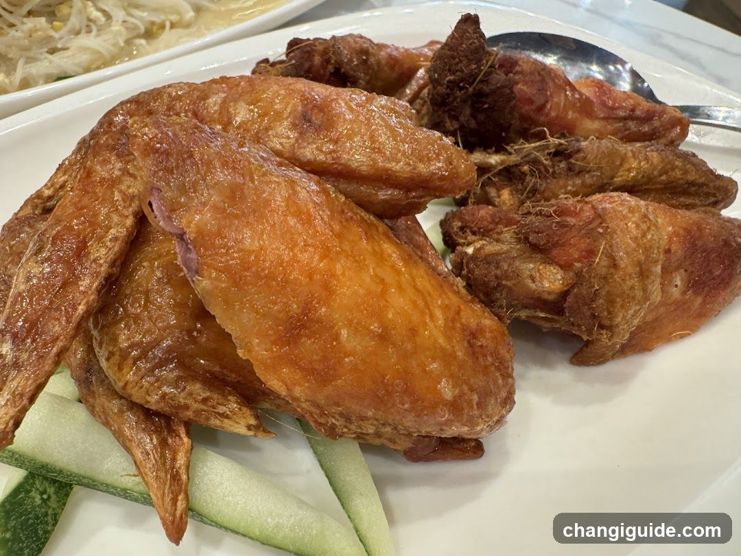 Fried Chicken Wings with Cucumber Slices