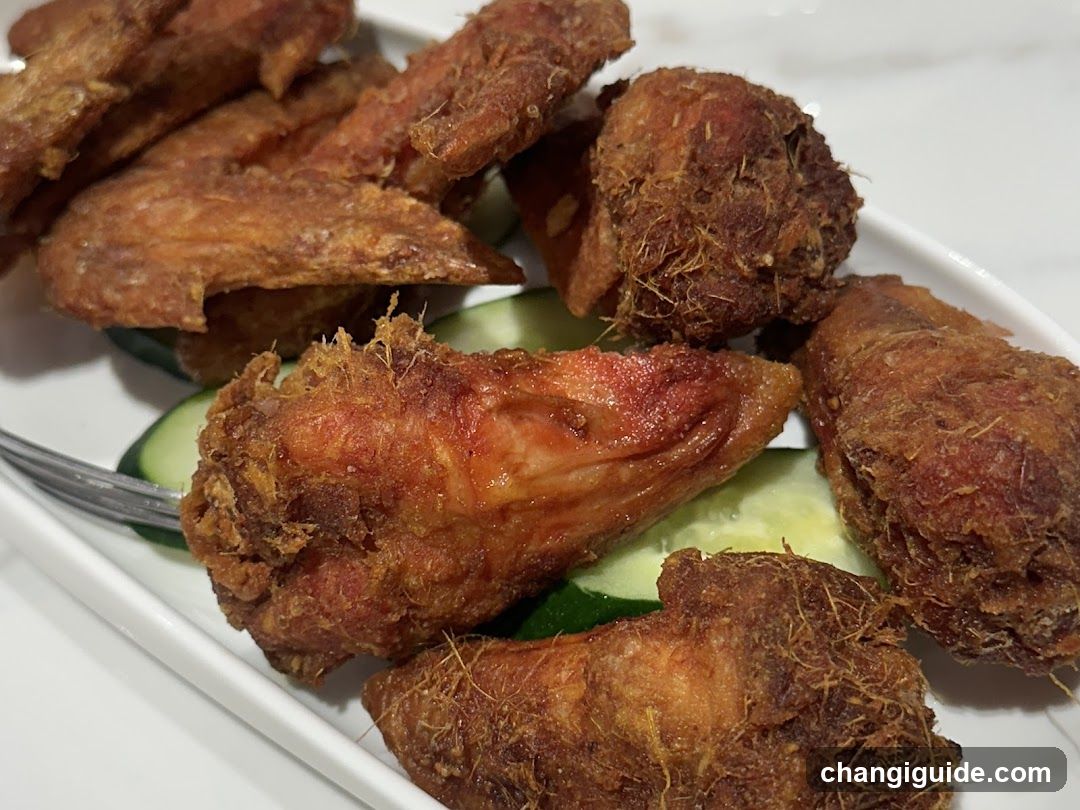 Fried Chicken Wings with Cucumber Slices