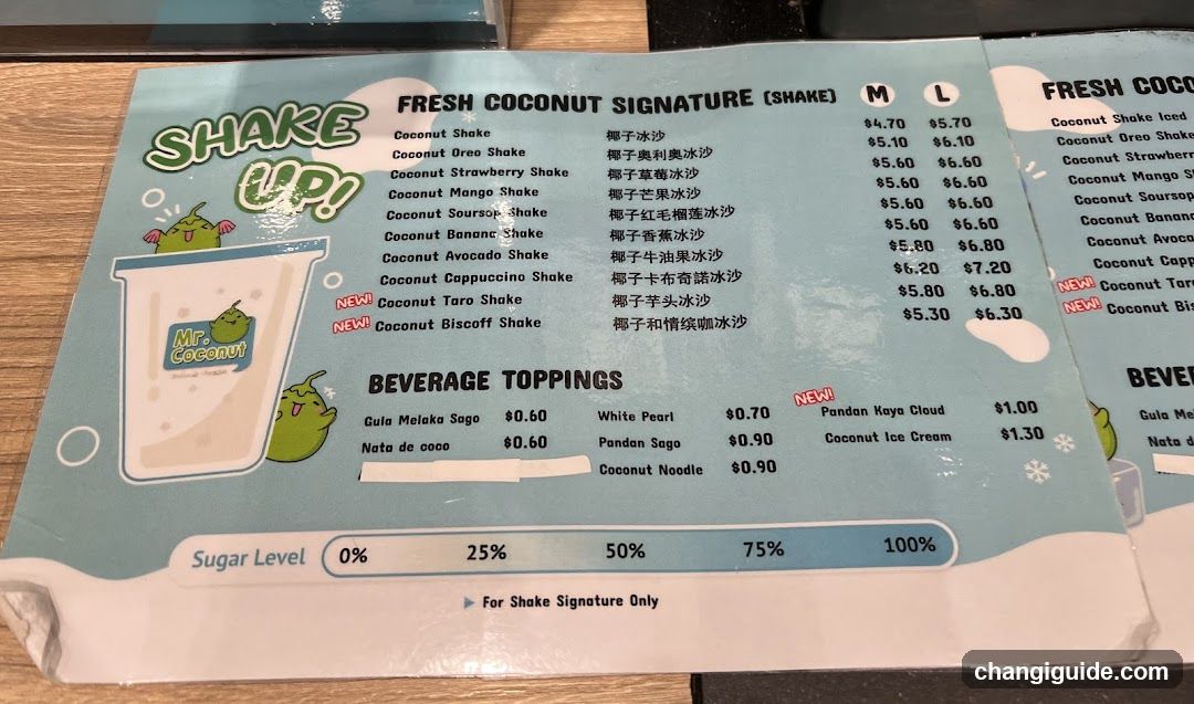 A printed menu board featuring a list of coconut-themed shakes and toppings, with prices in USD.