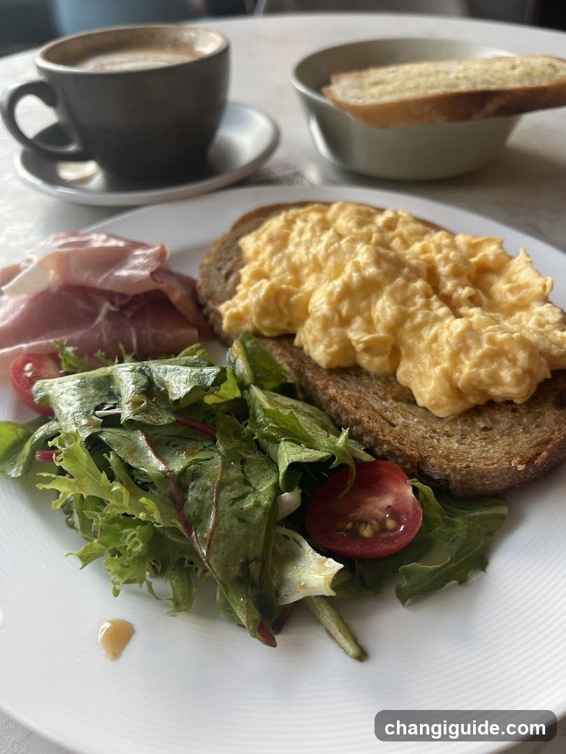 Breakfast with scrambled eggs and coffee