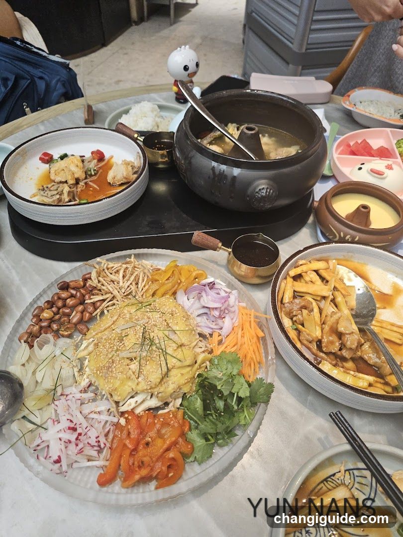 Dining Table with Hot Pot and Side Dishes