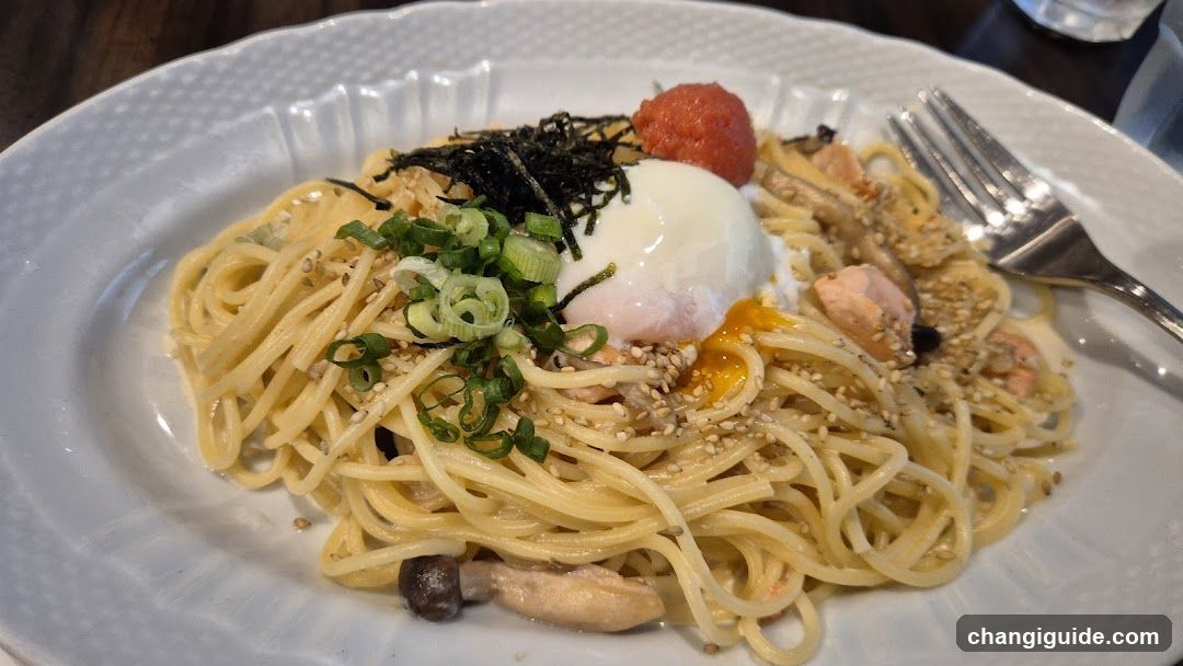 Pasta Dish with Poached Egg and Toppings