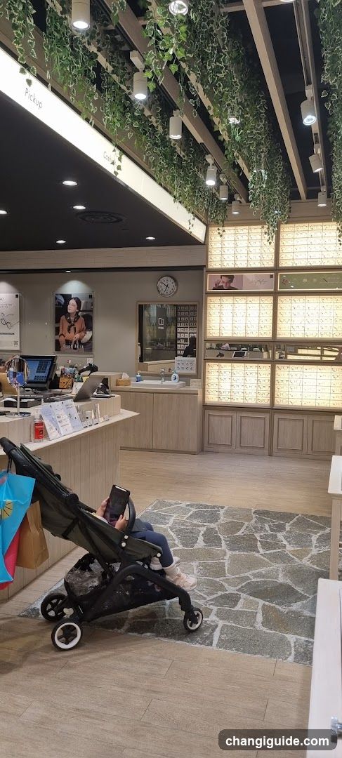 Interior of an optical store with baby stroller