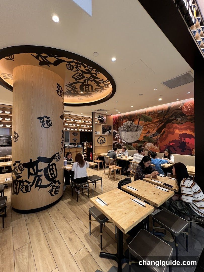 Restaurant Interior with Wooden Tables and Decorative Column