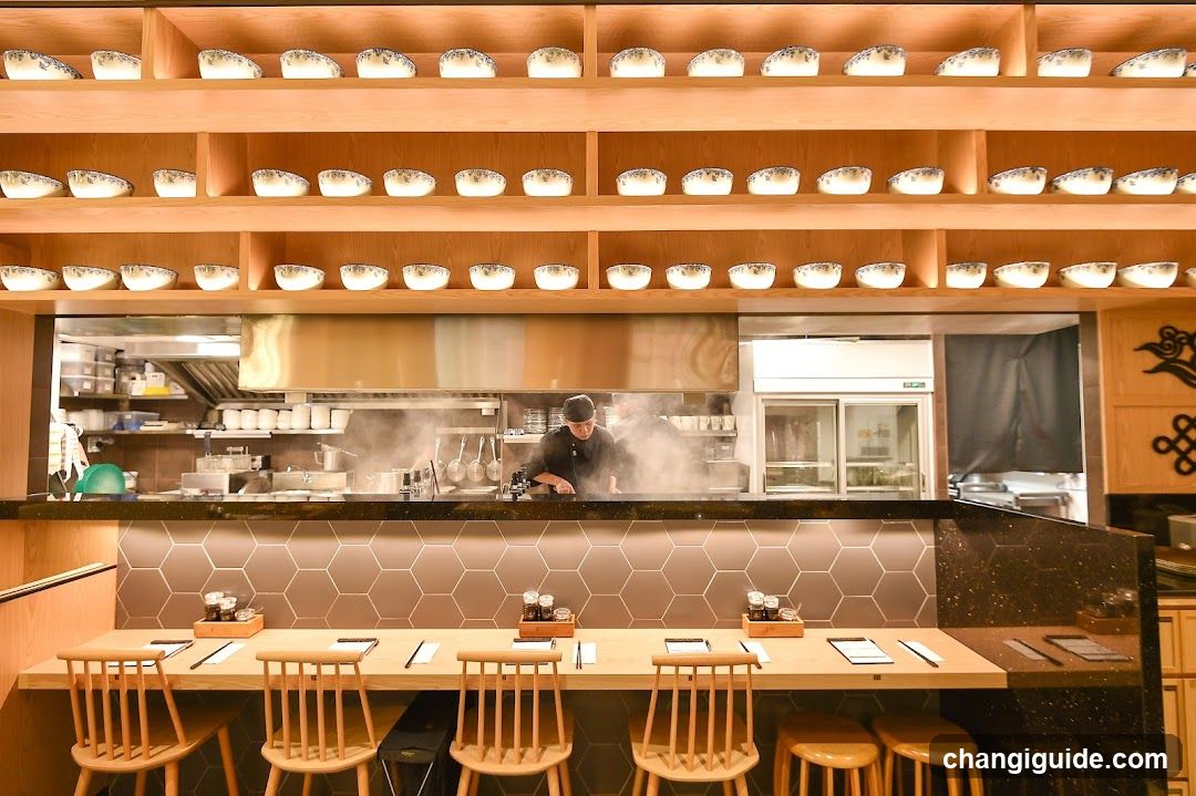 Restaurant Interior with Chef and Bowls Display