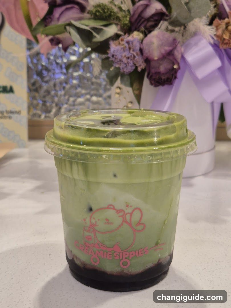 Matcha Drink with Flower Background