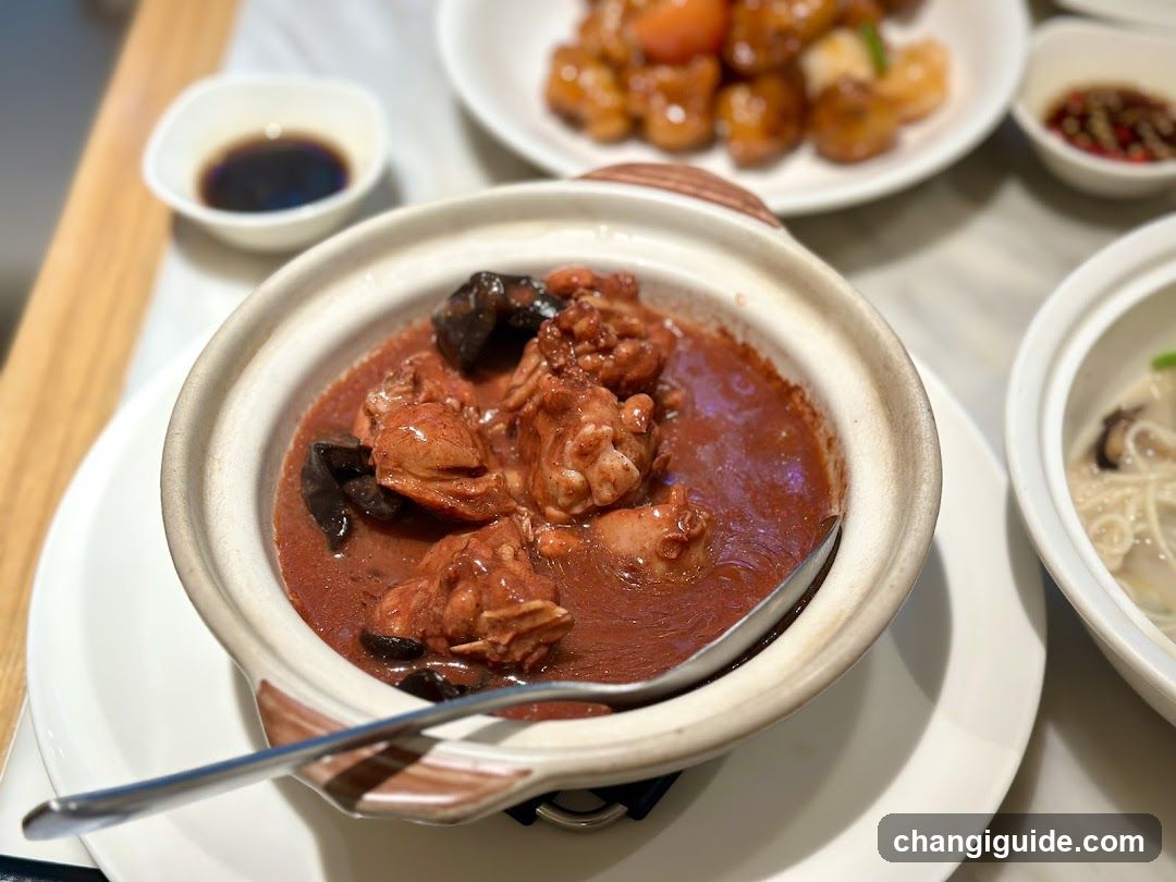 Cantonese-style claypot chicken stew with side dishes