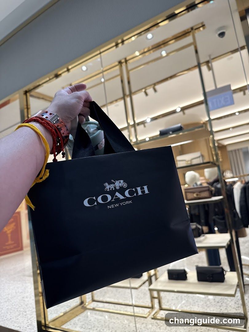 Coach Shopping Bag in Store Interior