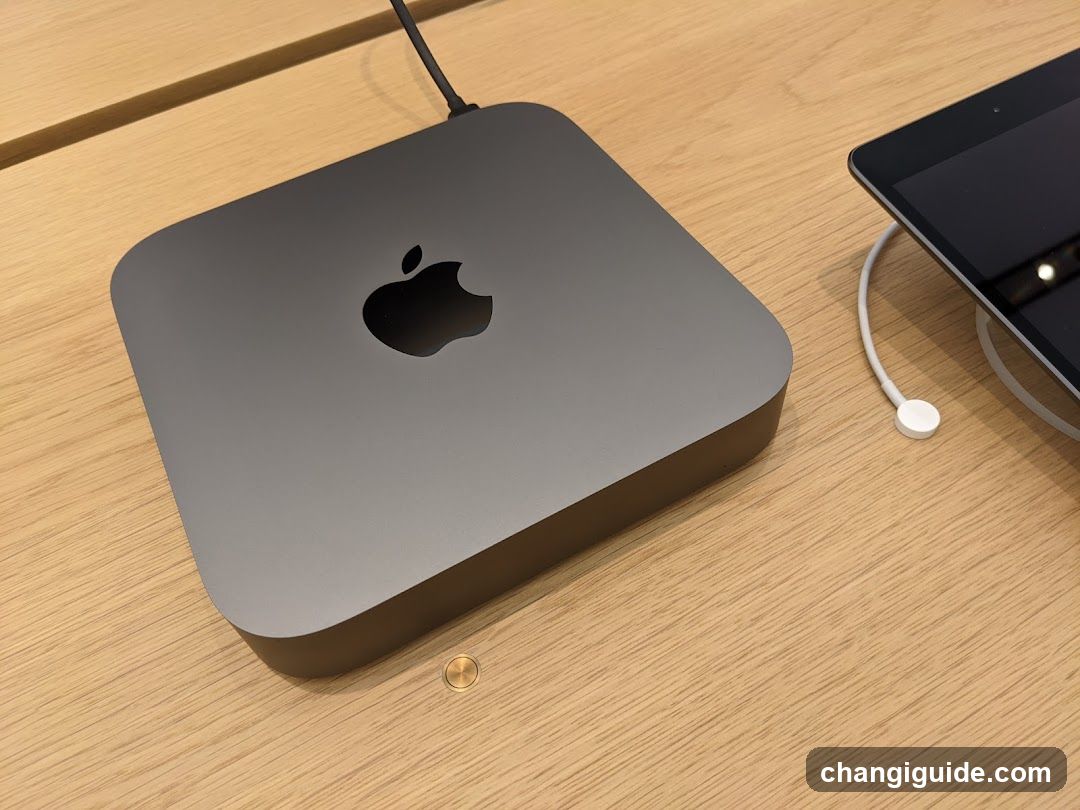 Apple Mac Mini on wooden table