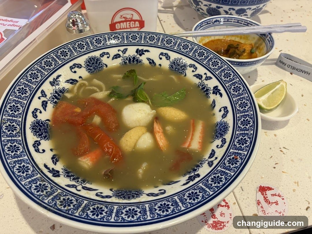 Noodle Soup Bowl with Seafood and Tomatoes