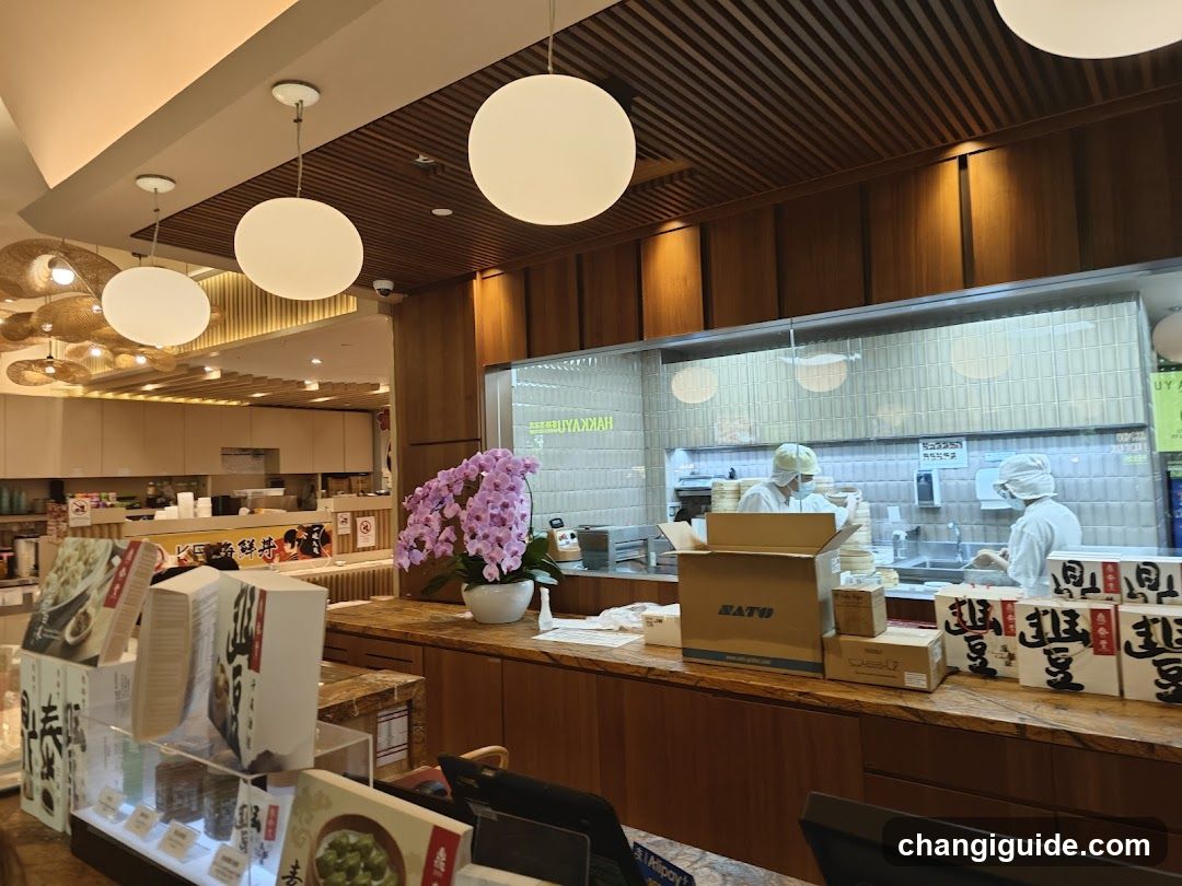Restaurant Interior with Staff and Counter Display