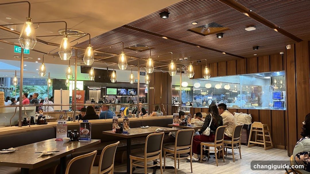 Restaurant Interior with Hanging Lights and Dining Area