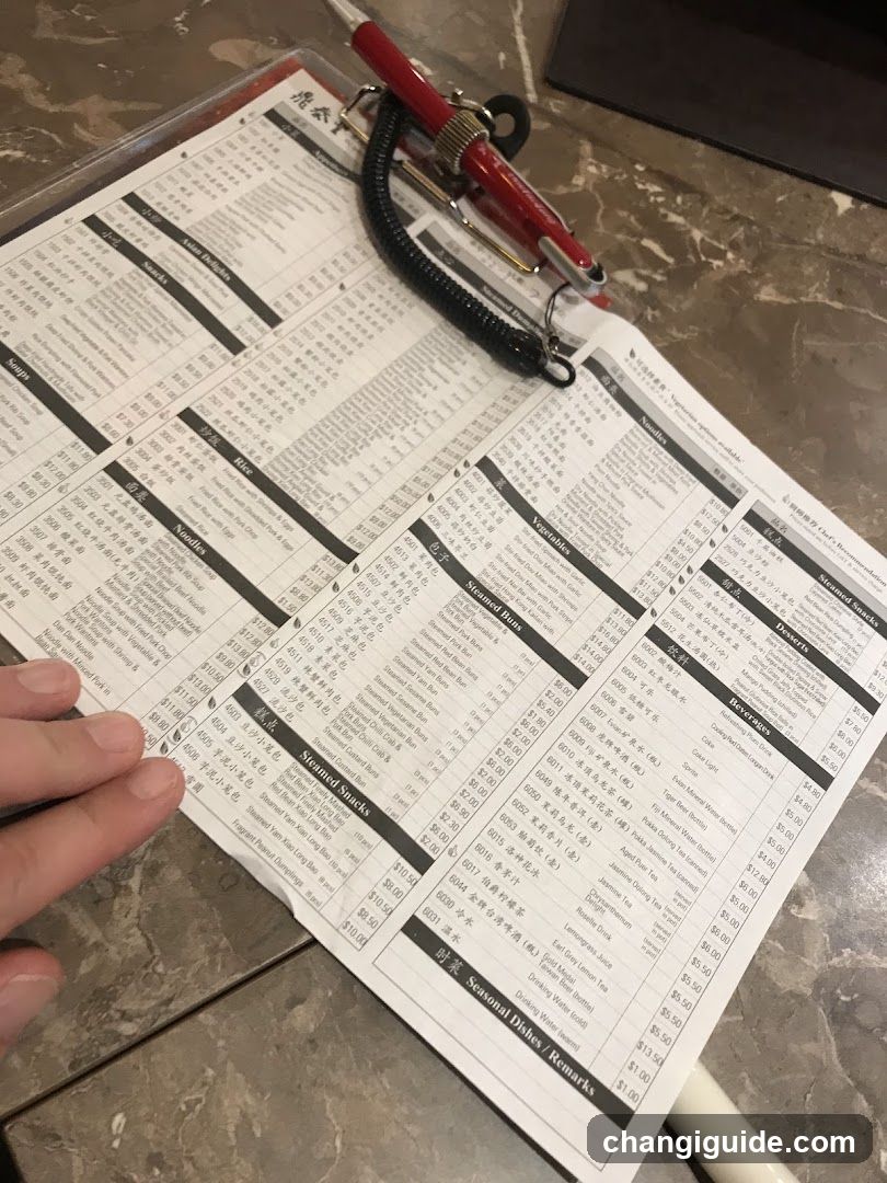 Sushi Menu with Pen Resting on It