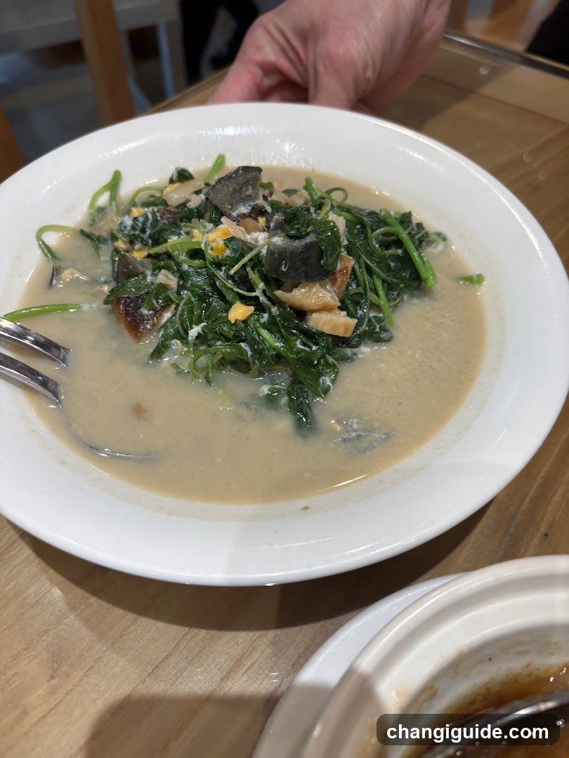 Dish with Creamy Broth and Greens