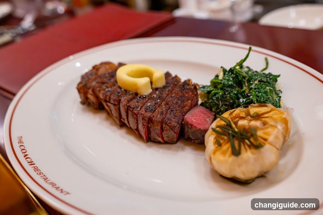 Steak with sides at The Coach Restaurant