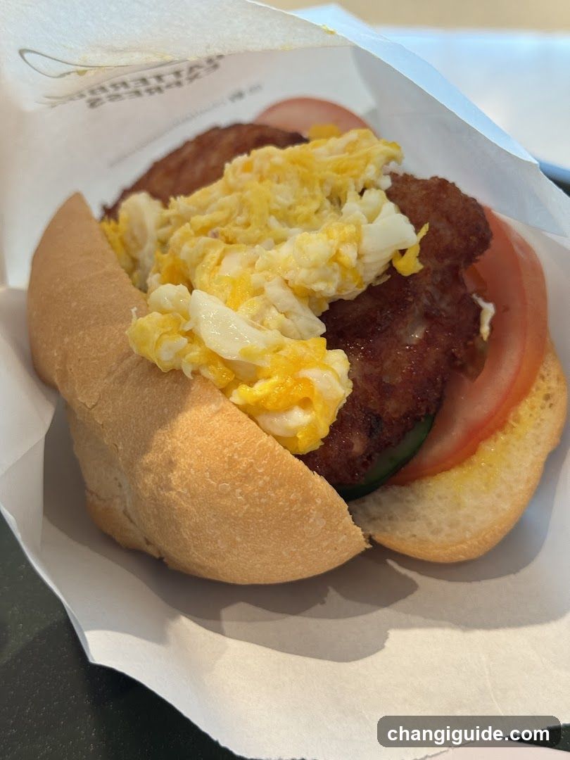 Breakfast Sandwich with Fried Egg and Meat Patty