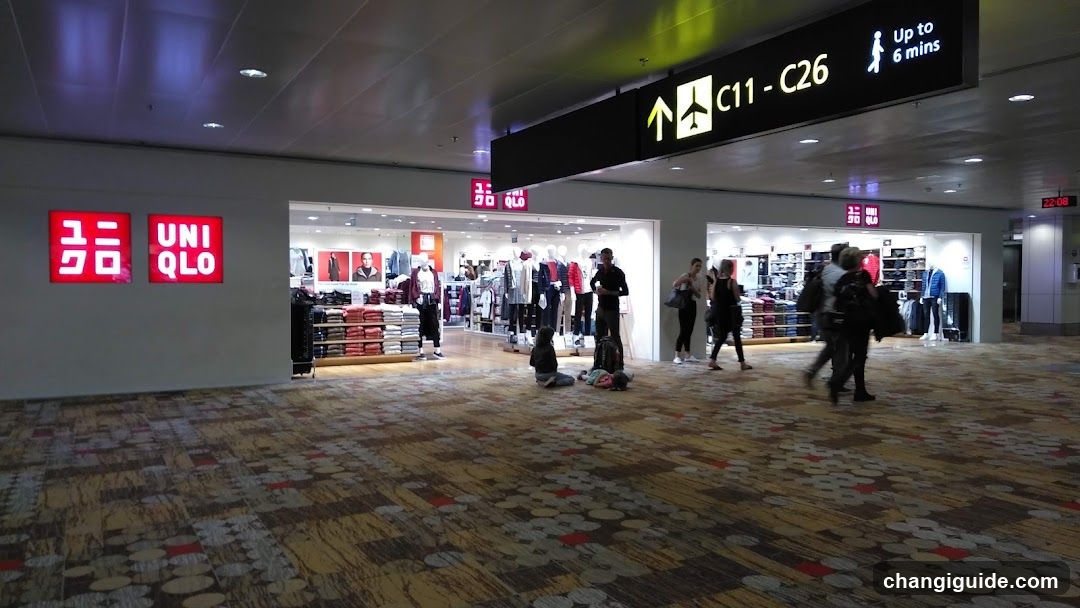 Airport Terminal Interior with Storefronts