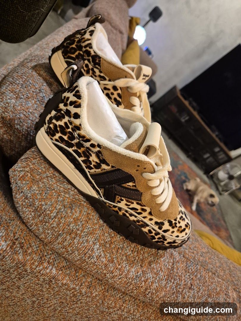 Leopard Print Sneakers on Sofa