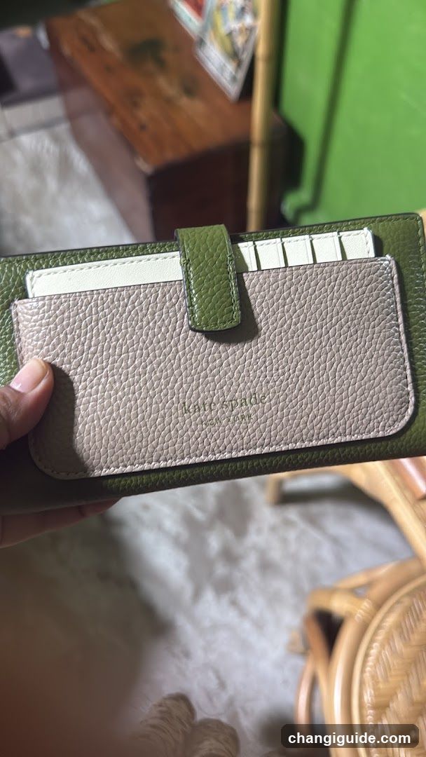 Handheld wallet with card slots