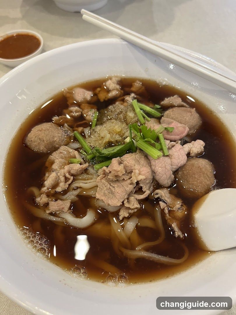 Bowl of Noodle Soup with Meatballs and Beef