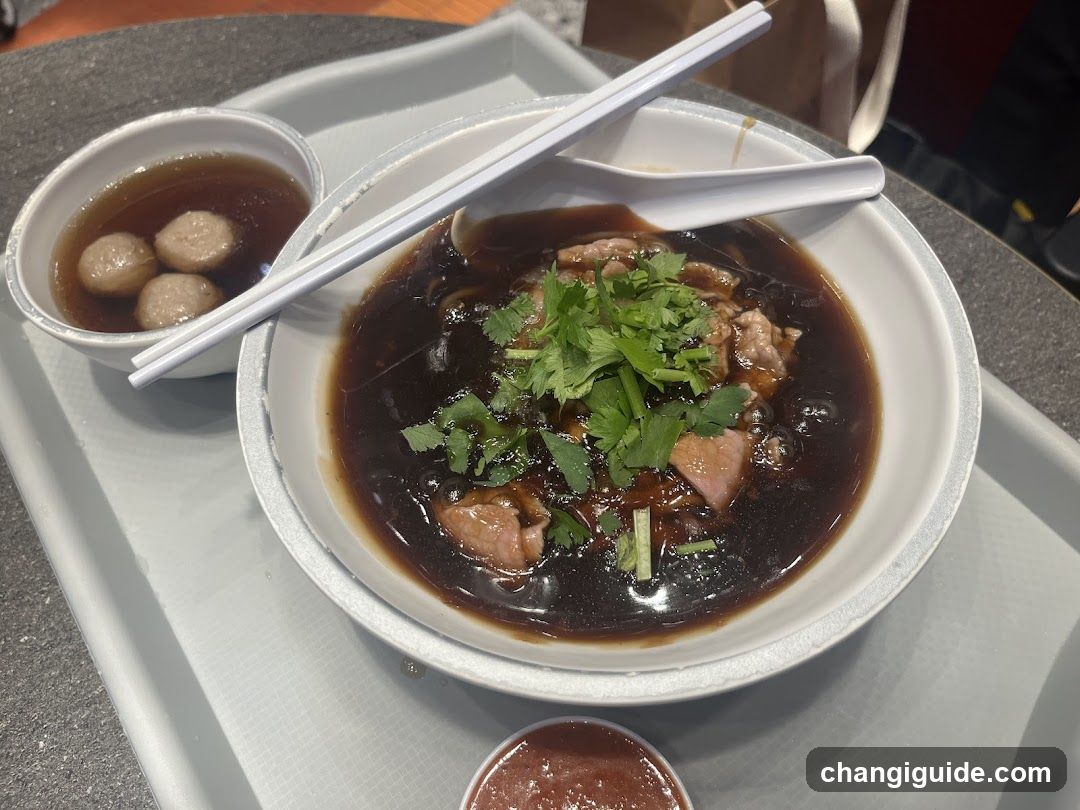 Bowl of Soup with Meatballs and Cilantro