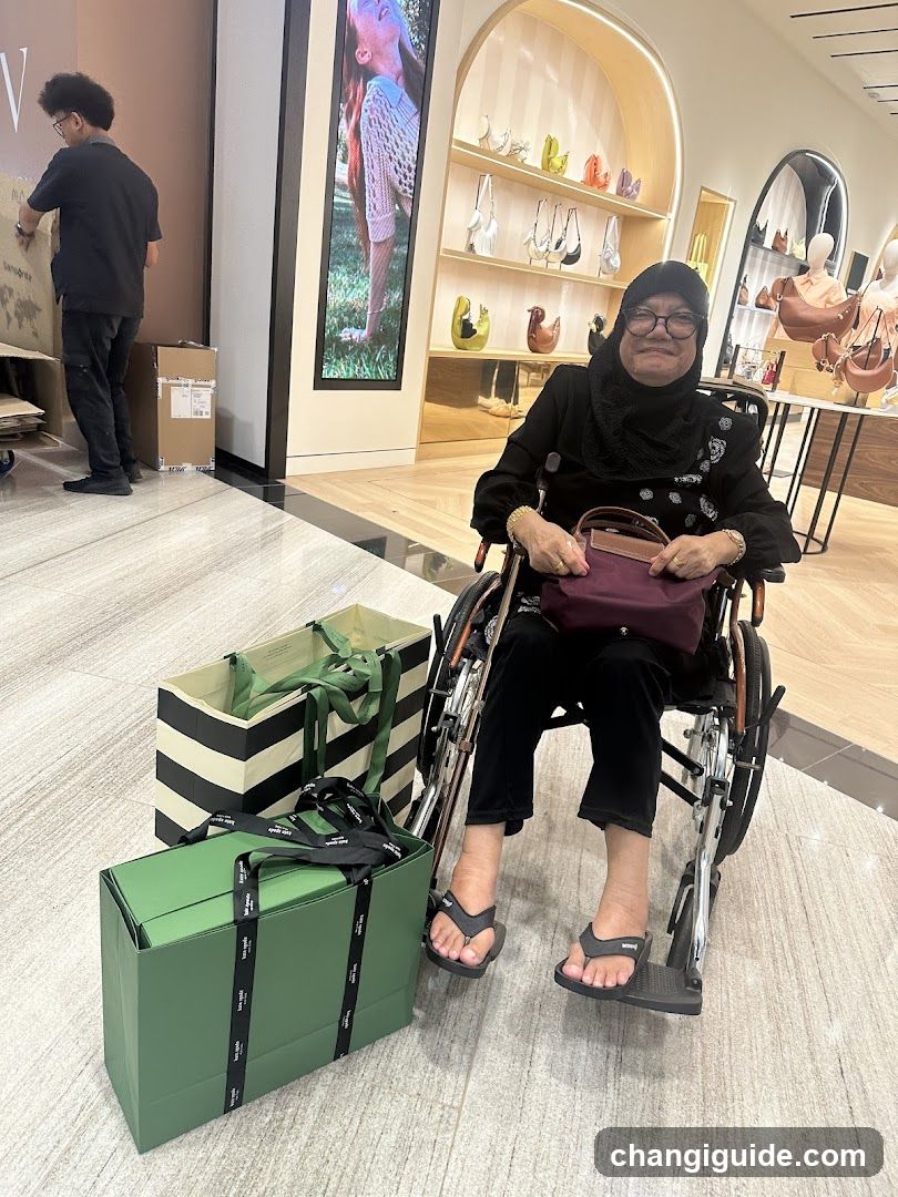 Woman in Wheelchair with Shopping Bags