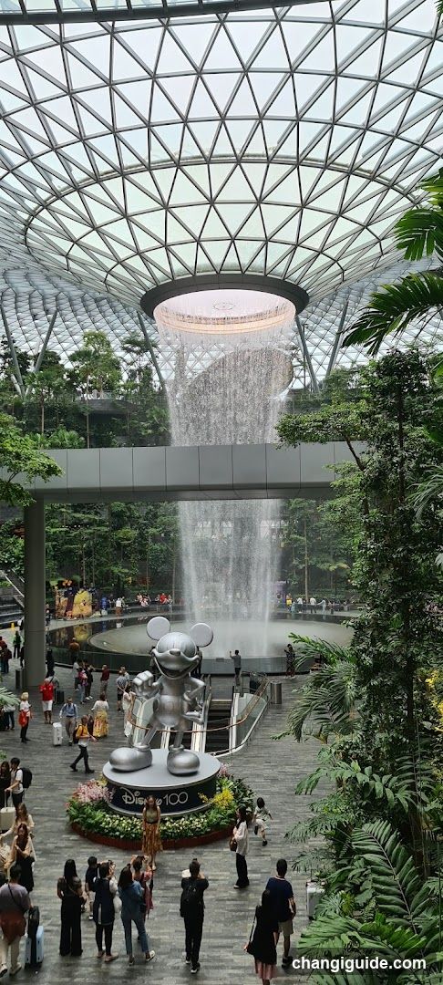 Indoor Waterfall and Mickey Mouse Statue
