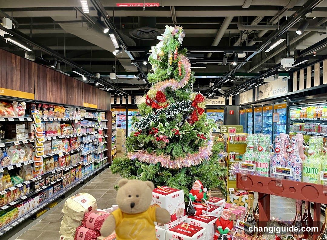 Christmas Tree in Grocery Store Aisle