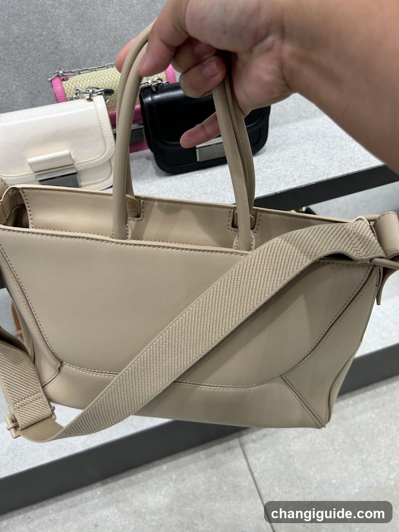 Handheld Beige Handbag Display