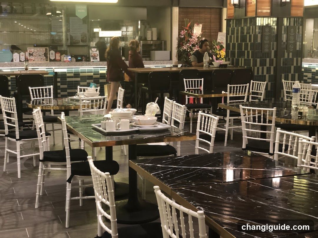 Restaurant Interior with Staff and Tables