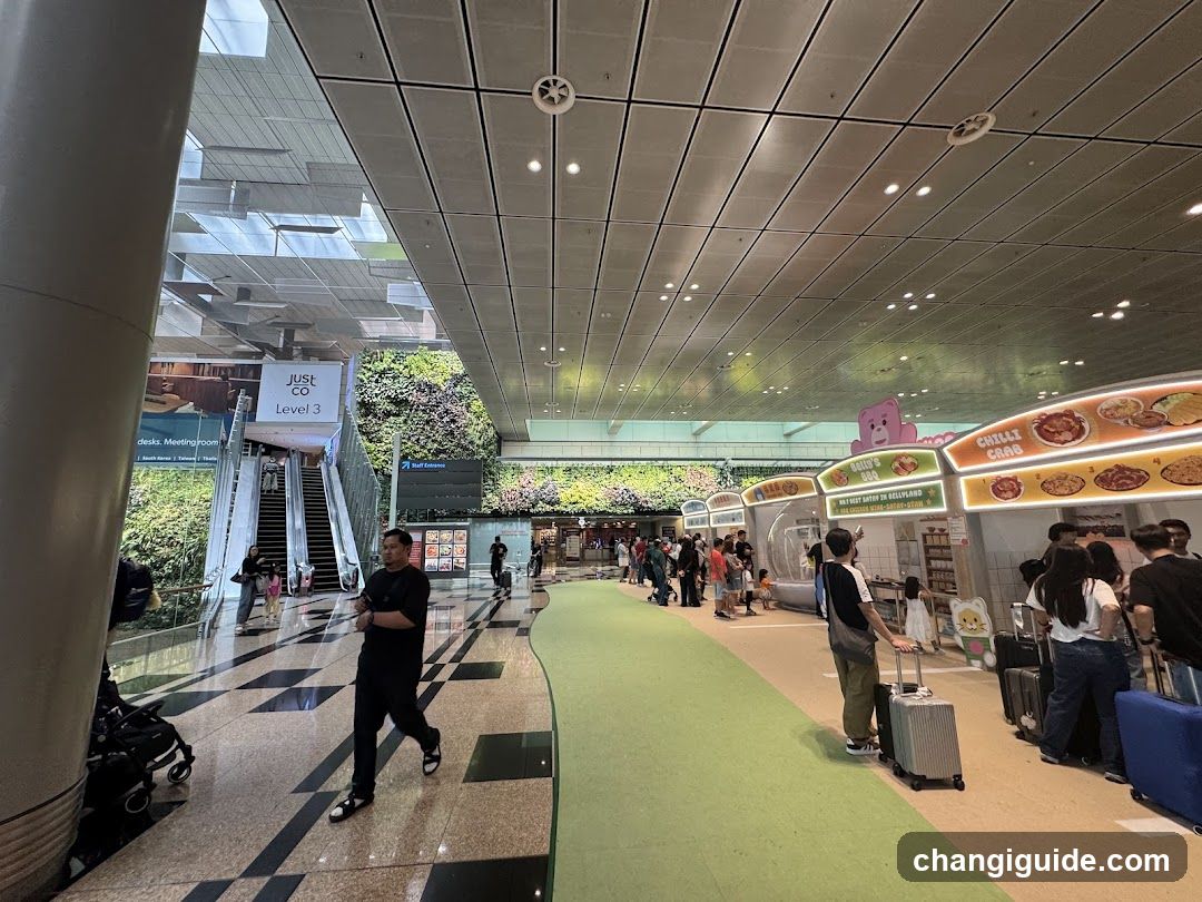 Airport Terminal Interior with Food Stalls and Greenery