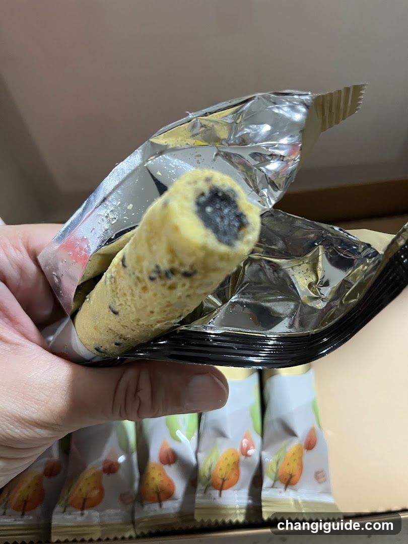 Hand holding a snack bar