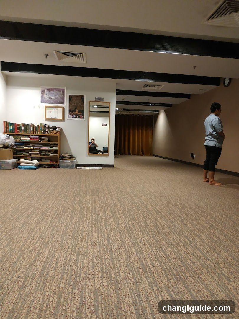 Interior Room with Bookshelf and Person Standing