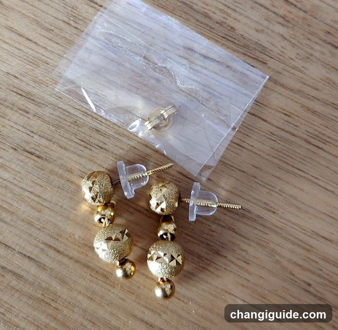 Gold Earrings with Clear Studs