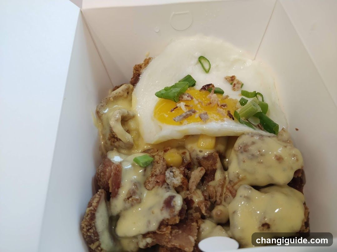 Fried Rice Bowl with Fried Egg and Cheese Sauce