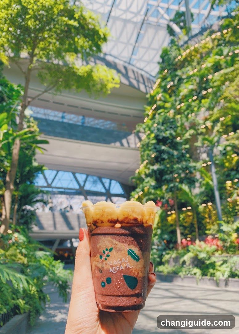 Boba drink in a lush indoor garden