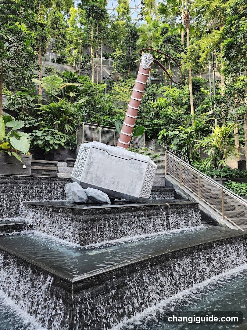 Thor's Hammer Sculpture in Water Feature